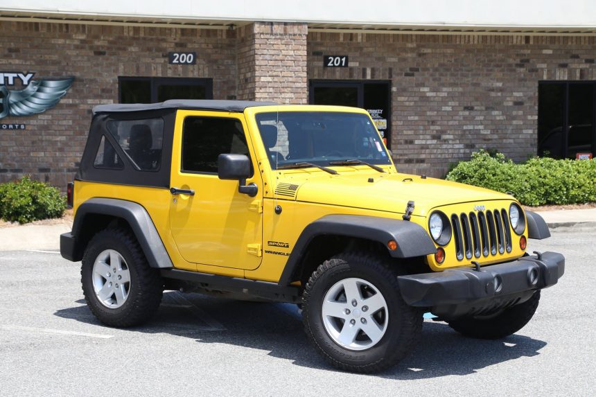 2012_Lifted_Yellow_Jeep_KMC_XD_Buck_Wheels_before