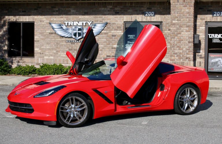red_c7_corvette_stingray_vertical_lambo_doors Trinity Motorsports