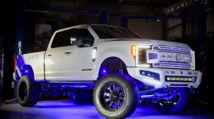Fabtech Lifted F-250 Platinum on Fuel wheels wrapped with Nittos