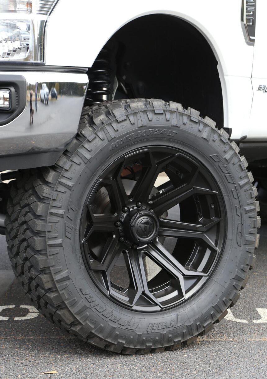 Trinity Motorsports lifted Savannah Ceramic Coatings Super Duty 8 inches Fabtech Dirt Logic lift 24×12 Fuel Off-Road Siege wheels 40-in Nitto Tire Trail Grapplers close