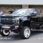 Chevy 2500HD Show Truck 9-in McGaughys lift and 24×14 American Forces