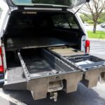 Work Truck with century cap and decked bed accessories at Trinity Motorsports in Pooler GA.